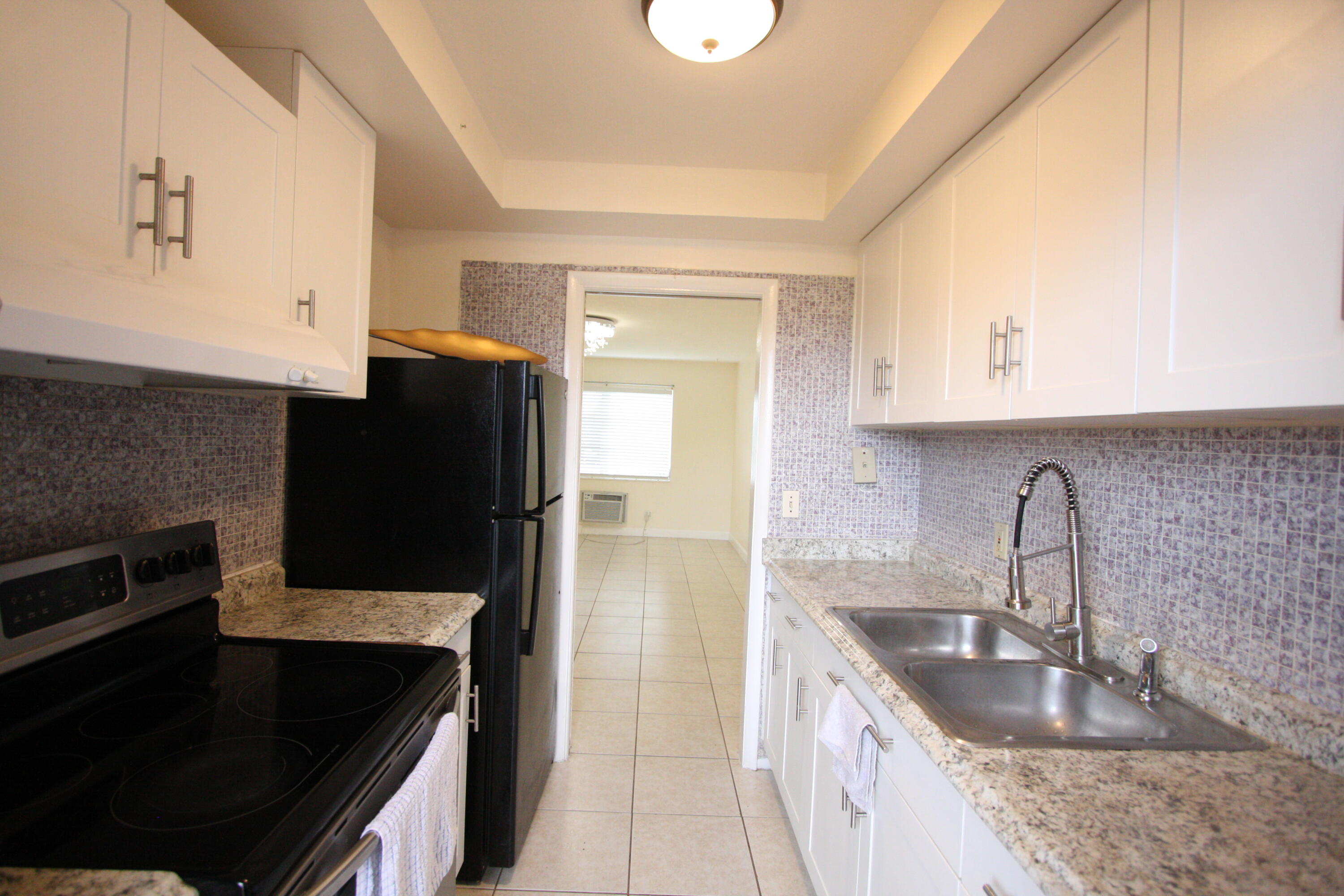 1050 East Sample Road, Unit 209 Pompano Beach, FL 33064 - Photo 14 of 27 IMG_6930