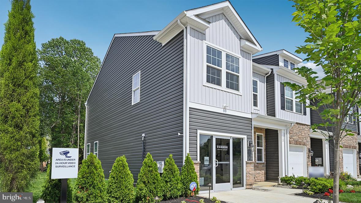 64 Robert Drive Runnemede, NJ 08078 - Photo 5 of 48 a front view of a house with plants and trees