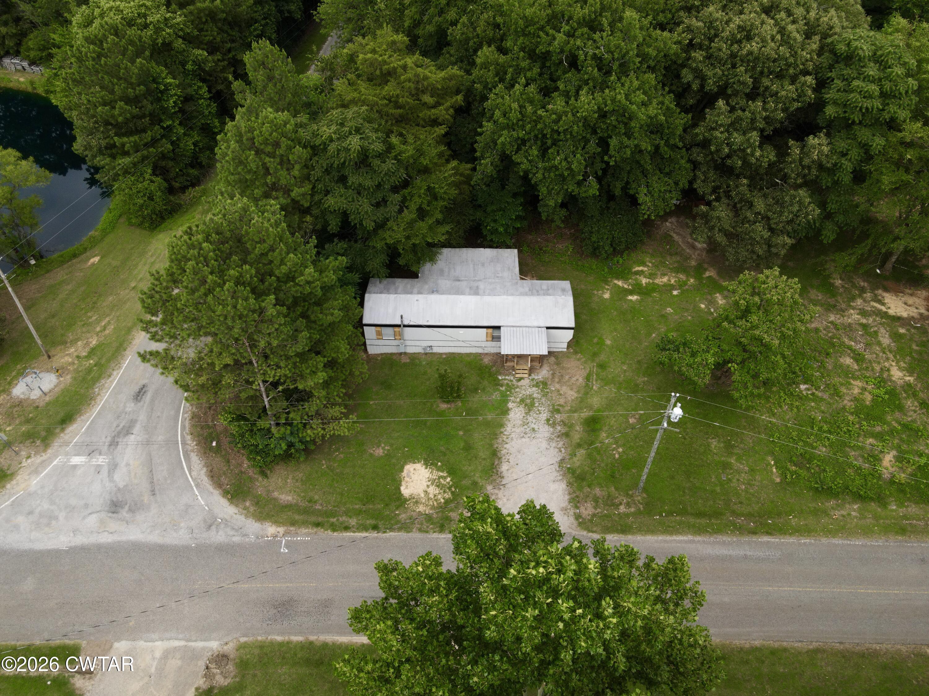 163 Walnut Grove Road Milan, TN 38358 - Photo 16 of 31 dji_fly_20260616_171510_182_178164814940