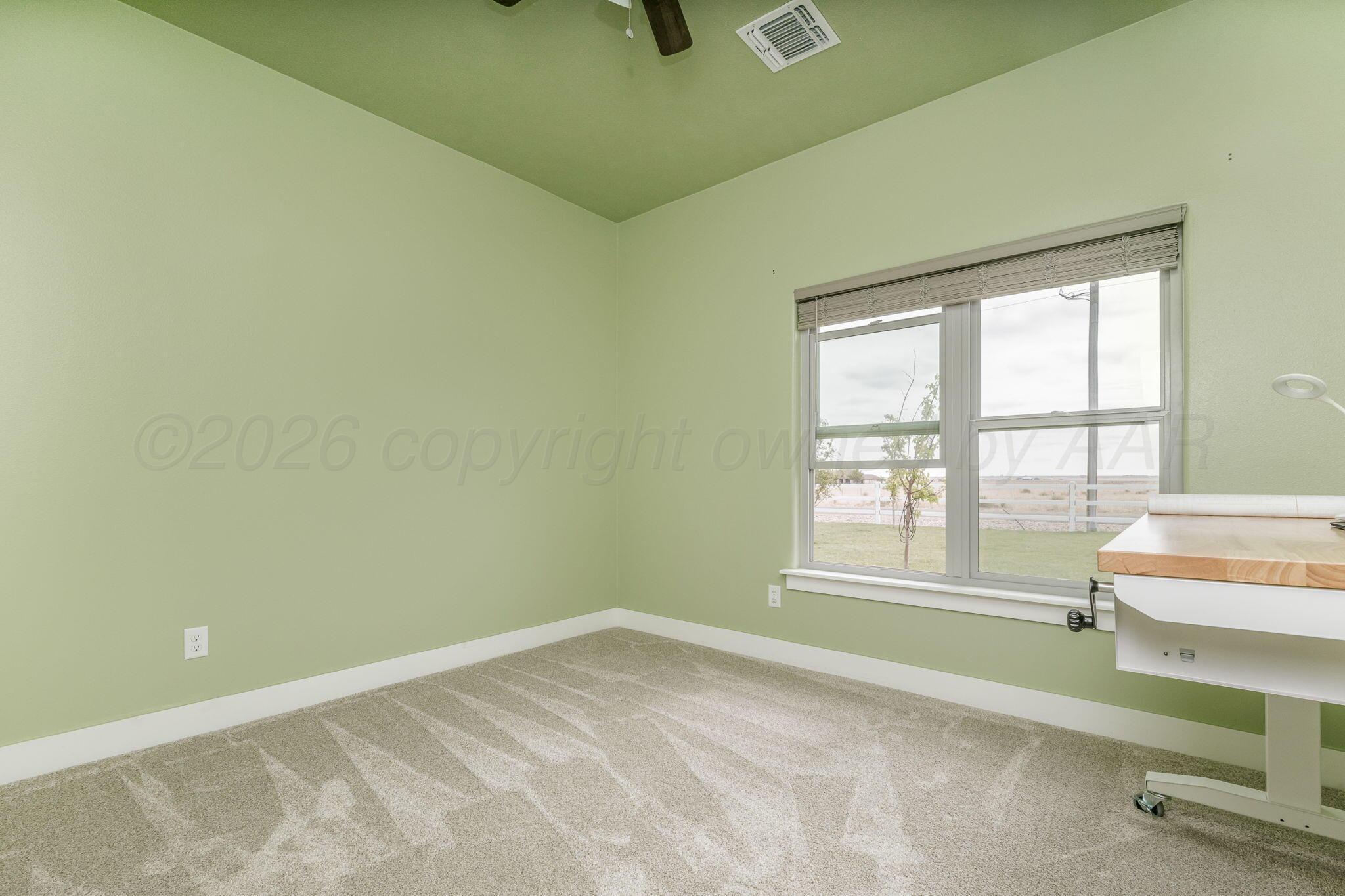 26150 Newton Road Canyon, TX 79015 - Photo 21 of 43 wooden floor and window in a room