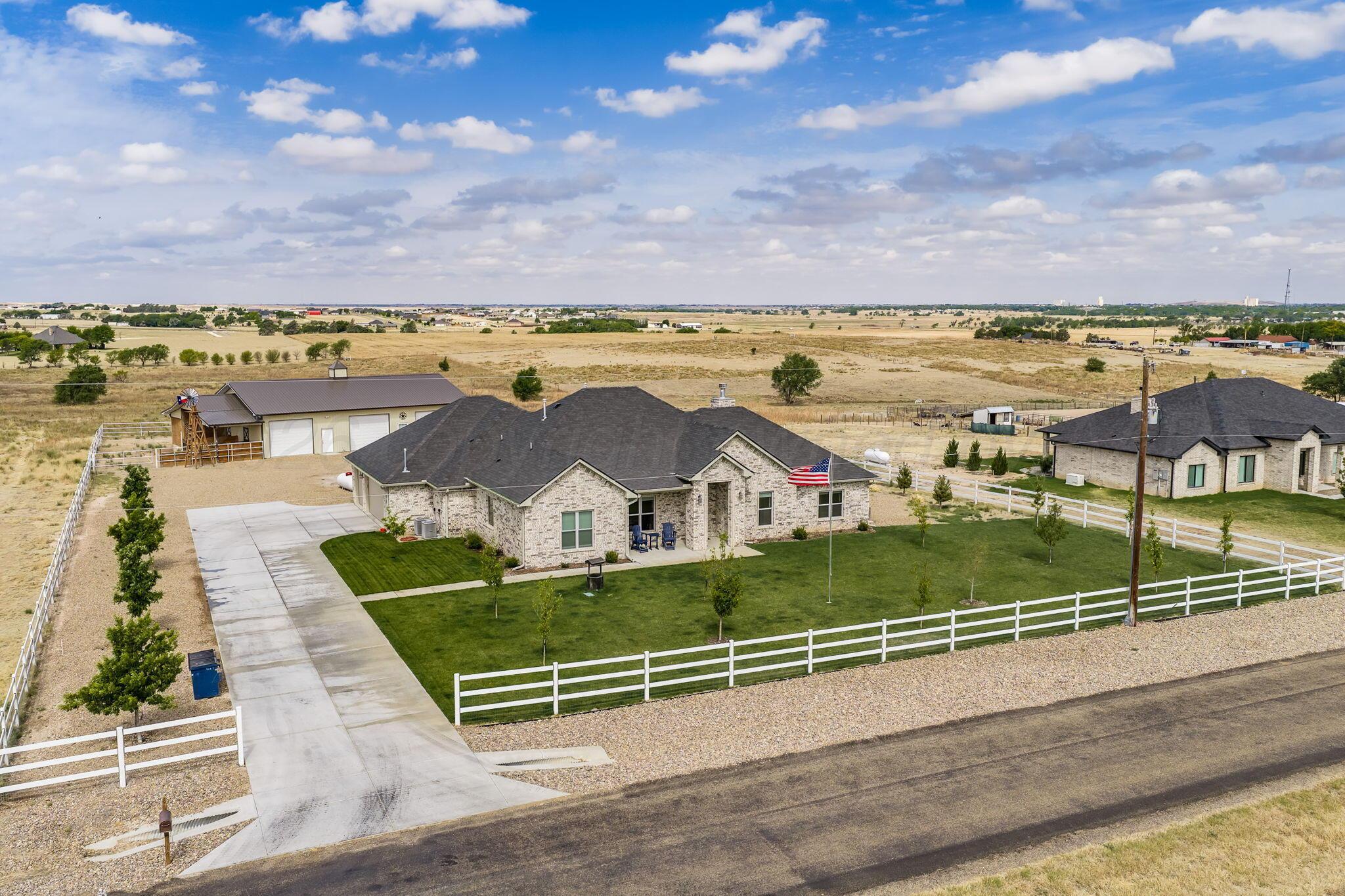 26150 Newton Road Canyon, TX 79015 - Photo 35 of 43 a view of a city with an ocean view