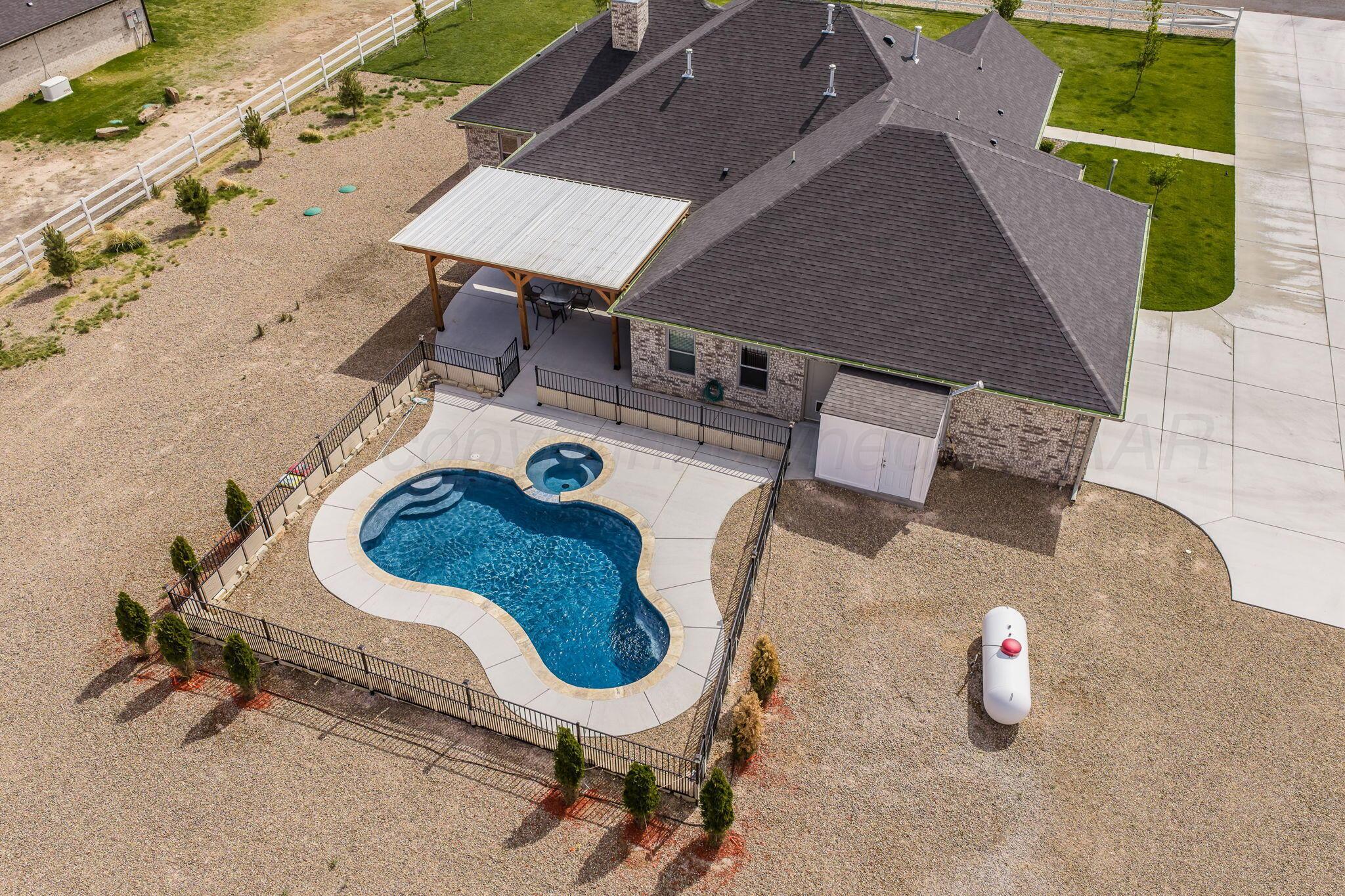 26150 Newton Road Canyon, TX 79015 - Photo 43 of 43 an aerial view of a swimming pool