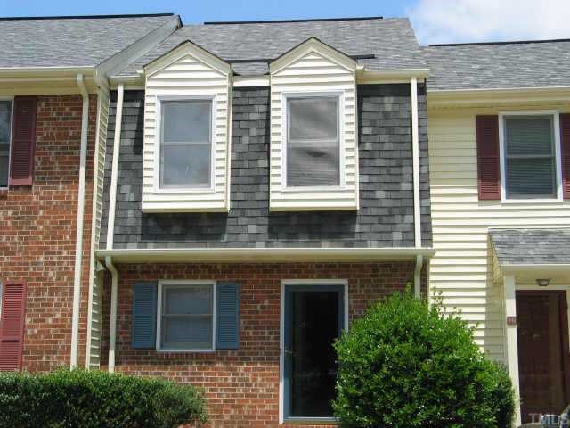 1503 Clermont Road Durham, NC 27713 - Photo 1 of 1 a view of a brick house with large windows
