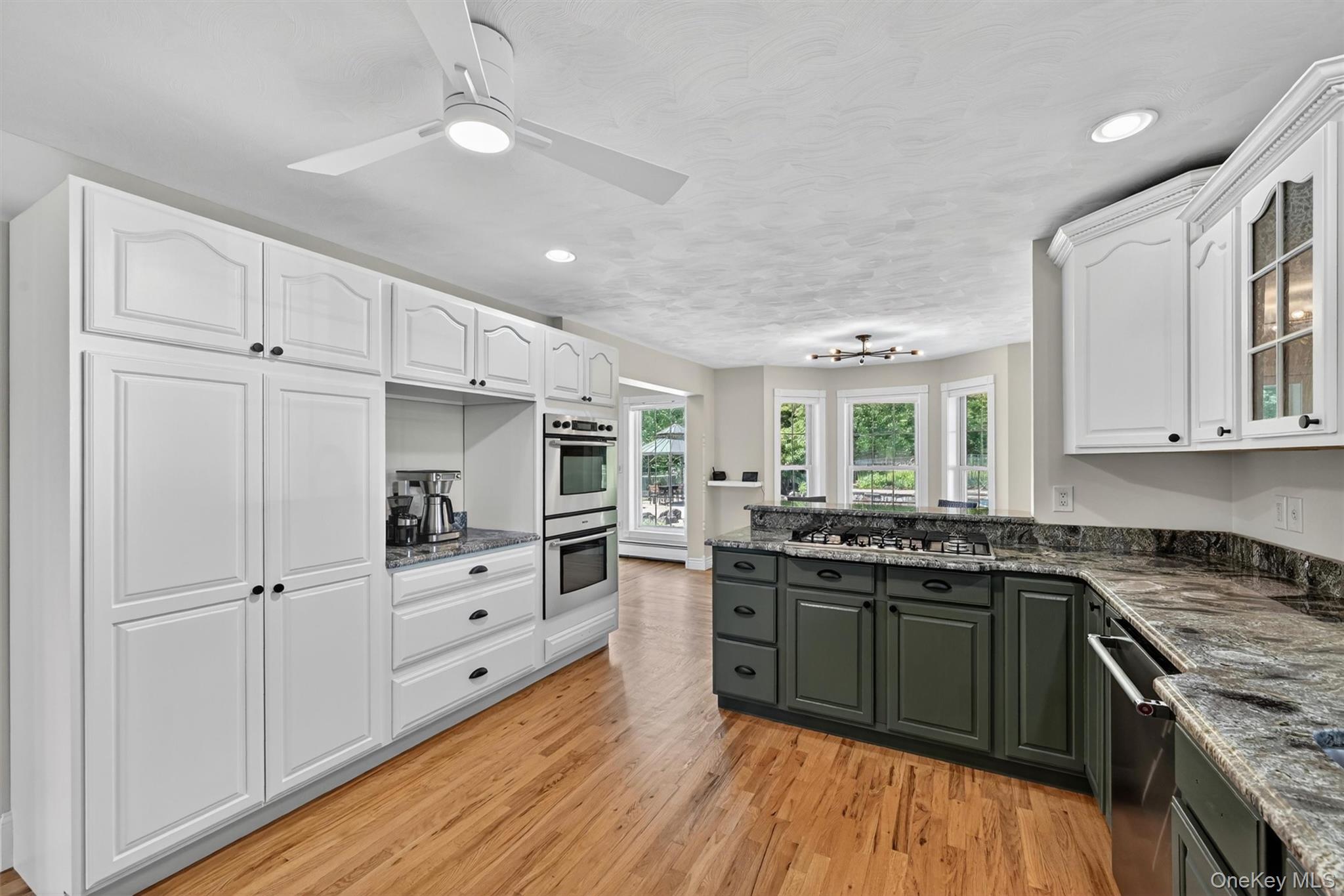 954 Ridgebury Road New Hampton, NY 10958 - Photo 21 of 45 The kitchen provides plenty of room to cook, gather, and move with ease, while the nearby dining area keeps everything feeling connected.