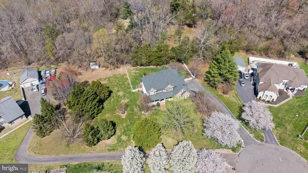 a kitchen with stainless steel appliances granite countertop a sink stove and microwave