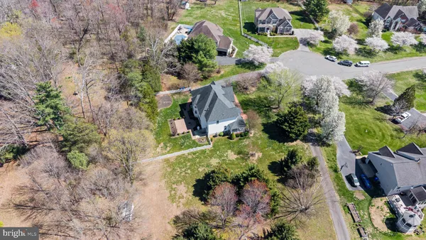 a kitchen with stainless steel appliances granite countertop a stove and a microwave