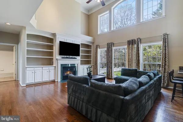 an empty room with windows and entrance