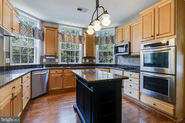 a room with a bed and a window