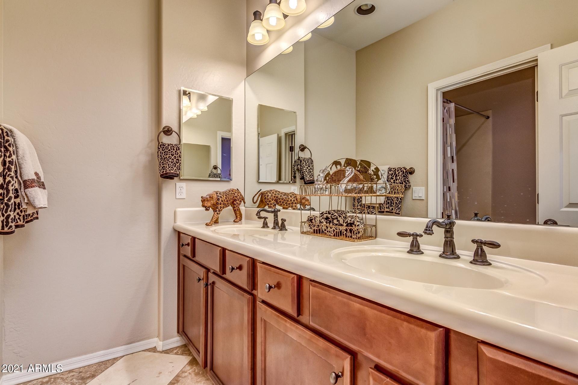 3935 East Rough Rider Road, Unit 1012 Phoenix, AZ 85050 - Photo 18 of 26 Guest Bath