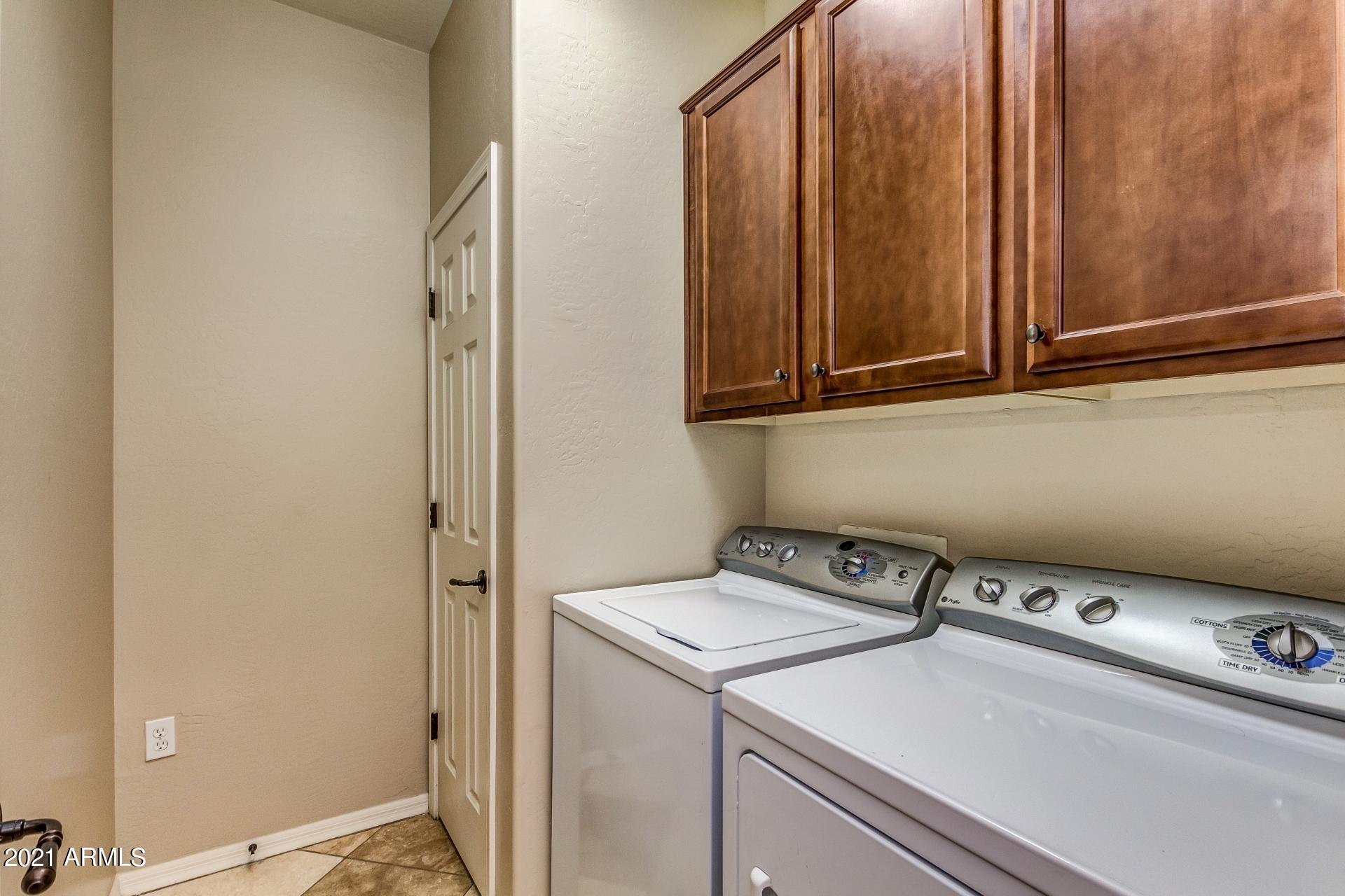 3935 East Rough Rider Road, Unit 1012 Phoenix, AZ 85050 - Photo 20 of 26 Laundry