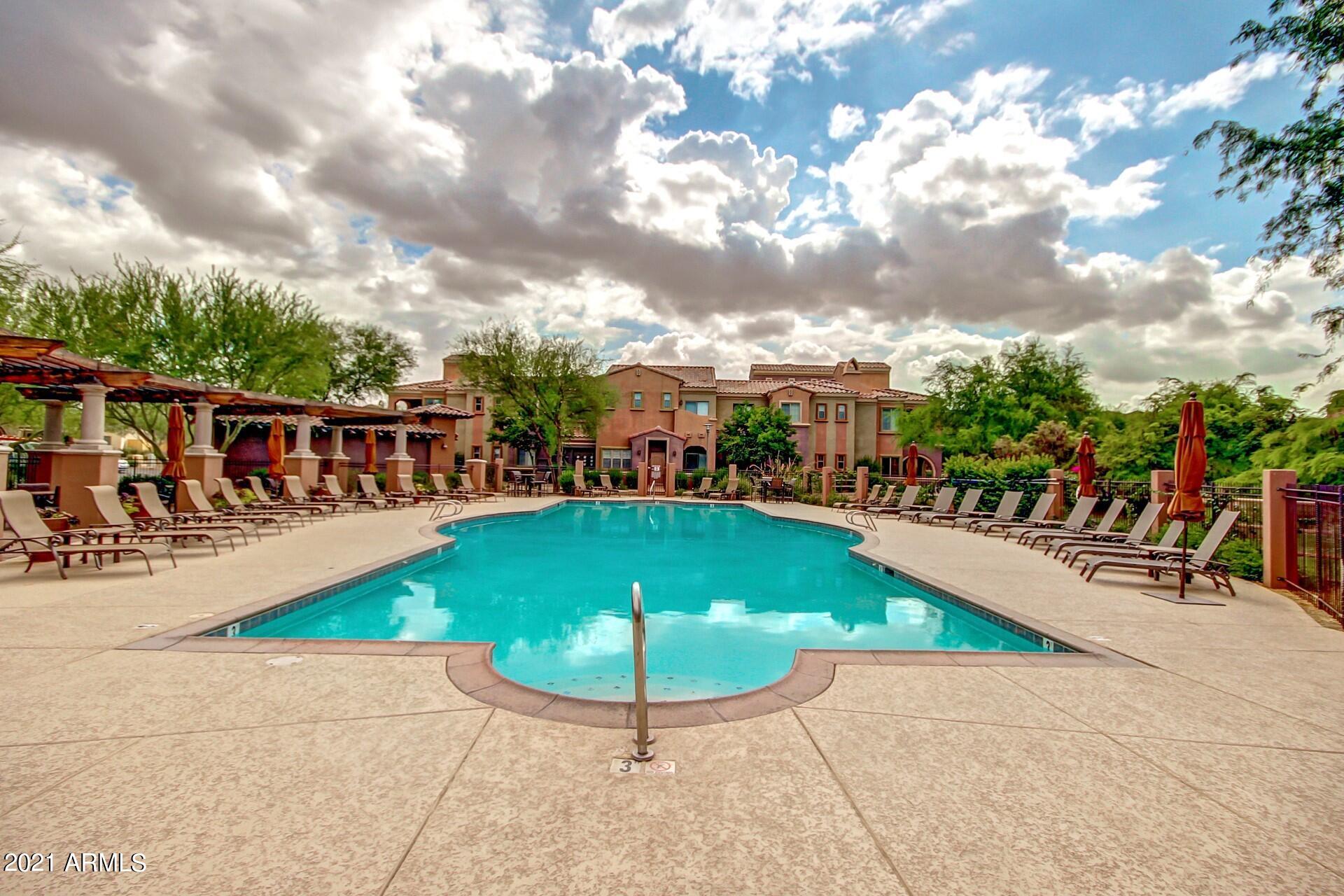 3935 East Rough Rider Road, Unit 1012 Phoenix, AZ 85050 - Photo 25 of 26 Pool Clouds