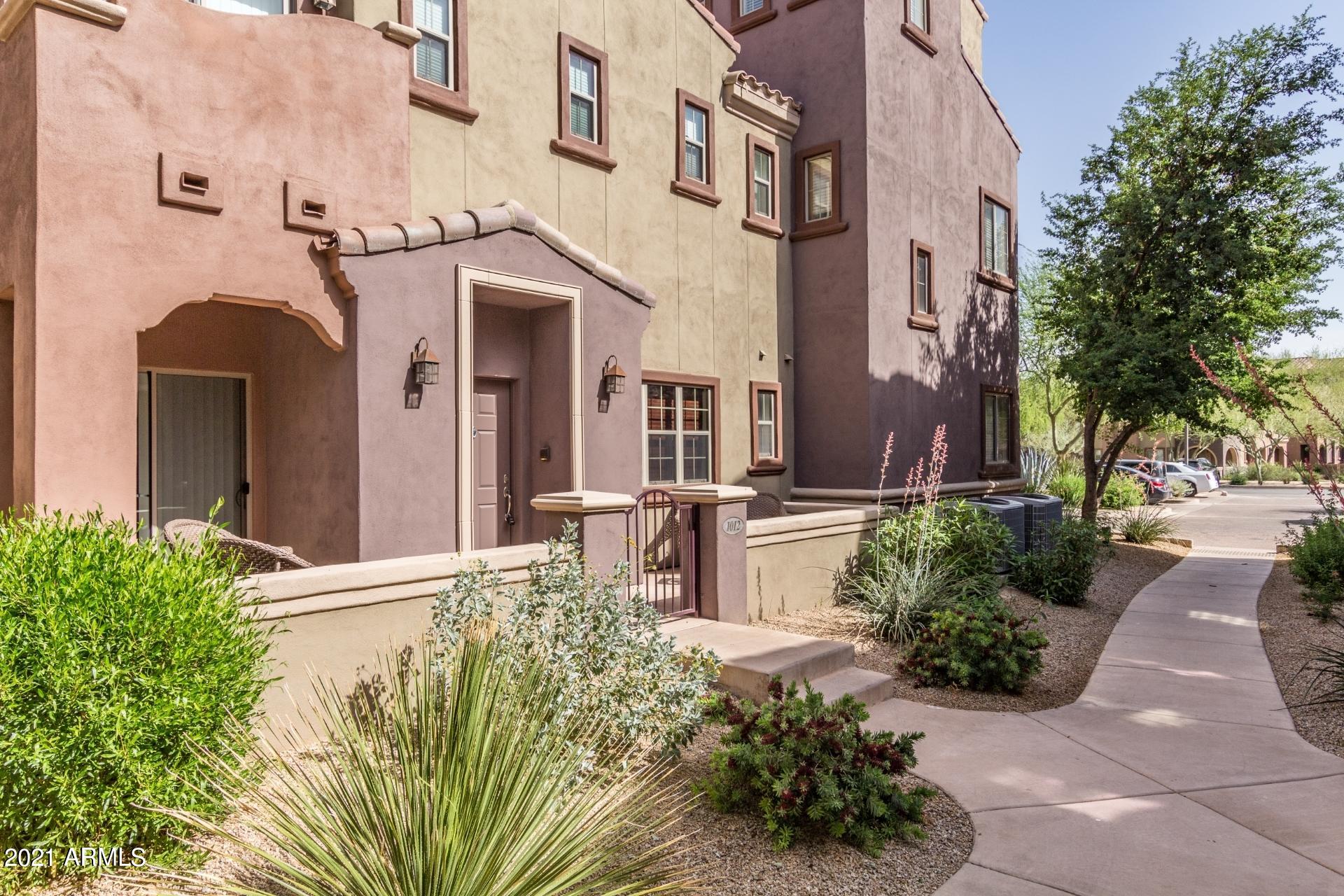 3935 East Rough Rider Road, Unit 1012 Phoenix, AZ 85050 - Photo 3 of 26 Front Walkway