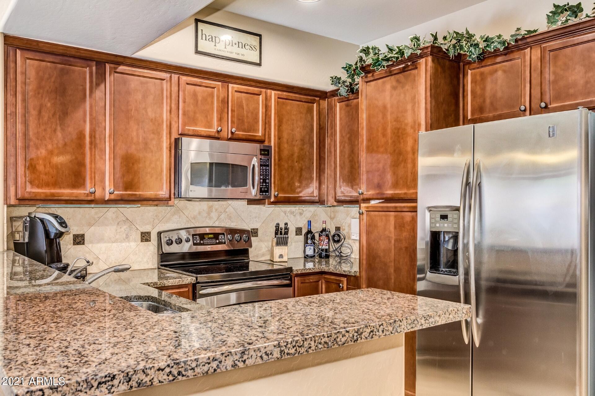 3935 East Rough Rider Road, Unit 1012 Phoenix, AZ 85050 - Photo 5 of 26 Kitchen Counter