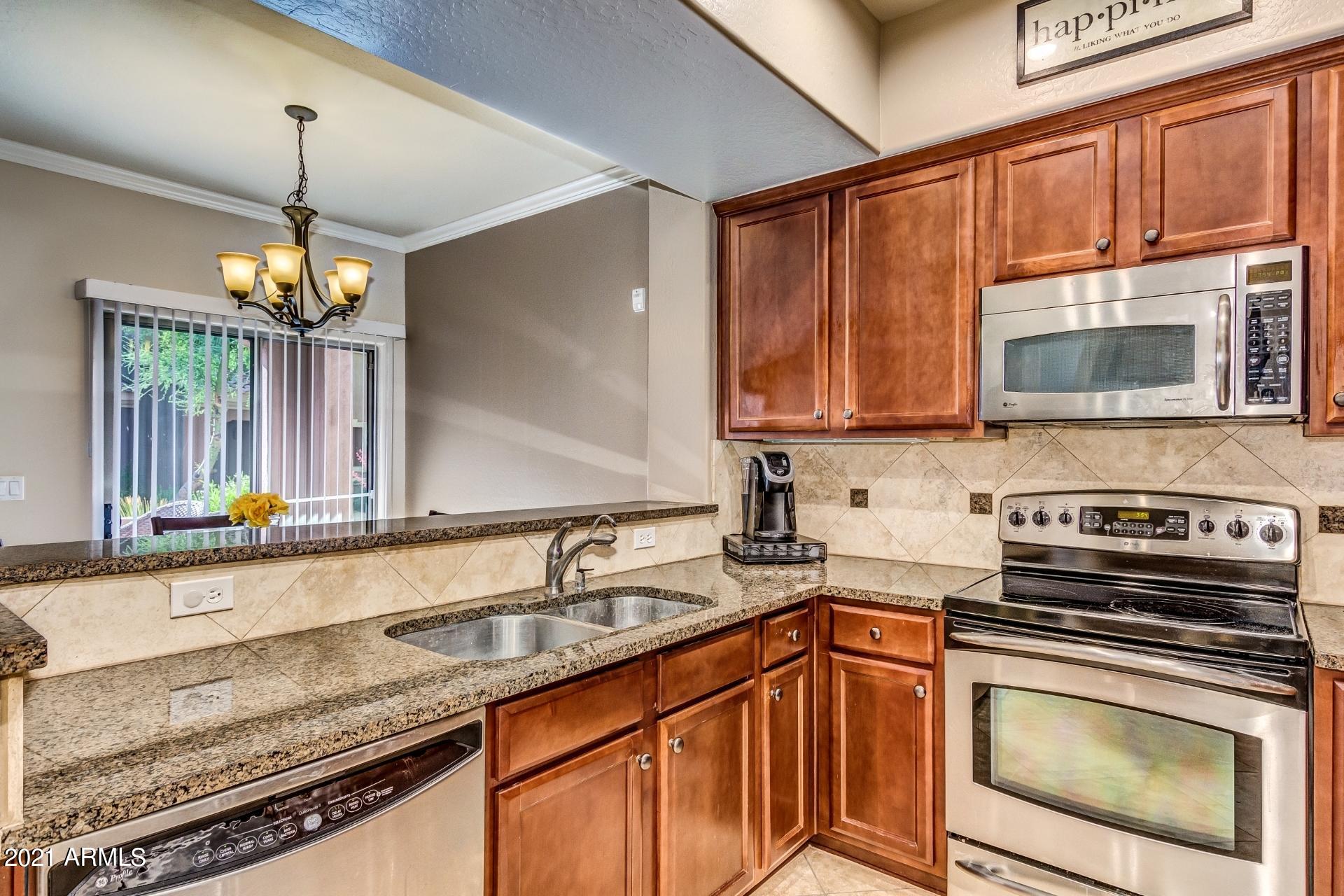 3935 East Rough Rider Road, Unit 1012 Phoenix, AZ 85050 - Photo 10 of 26 Kitchen Sink