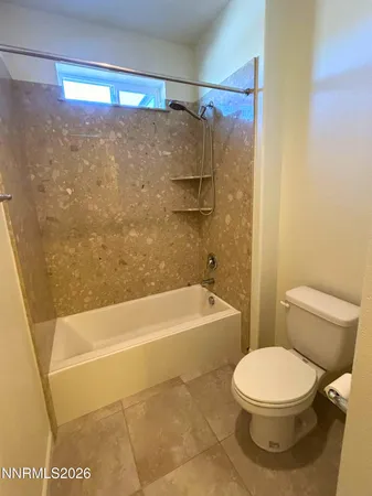 a view of a garden with large trees