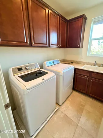 a view of a yard and an ocean view