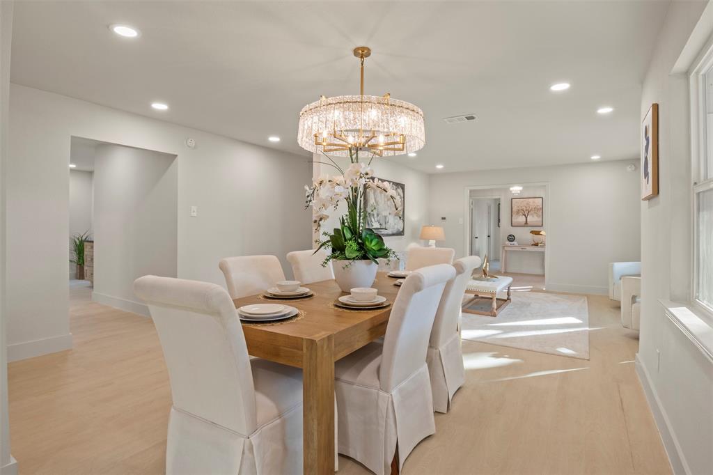 10427 Carry Back Place Dallas, TX 75229 - Photo 12 of 40 a view of a dining room with furniture