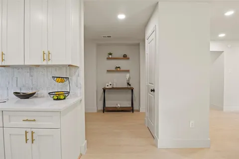 a bathroom with a toilet sink and shower