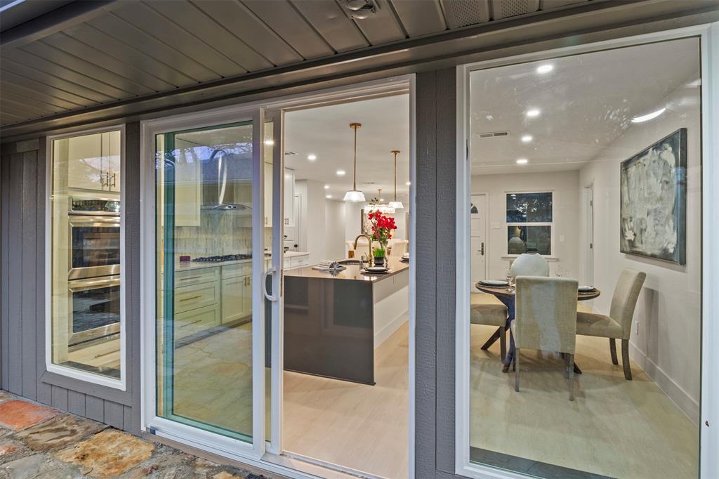 10427 Carry Back Place Dallas, TX 75229 - Photo 20 of 40 a view of a dining room with furniture