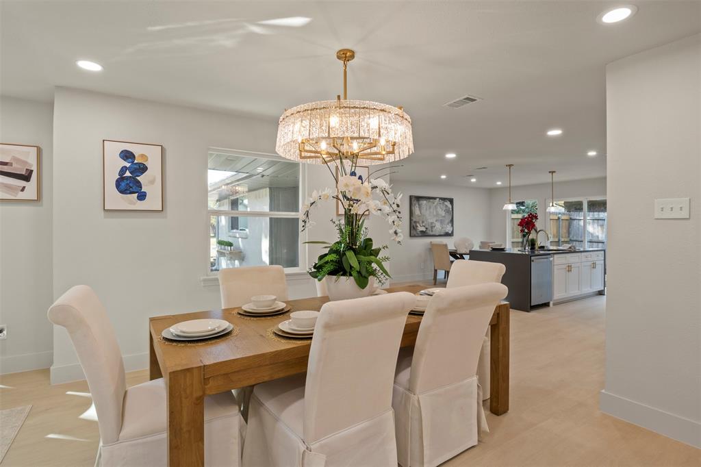 10427 Carry Back Place Dallas, TX 75229 - Photo 5 of 40 Spacious Dining area illuminated with glass chandelier
