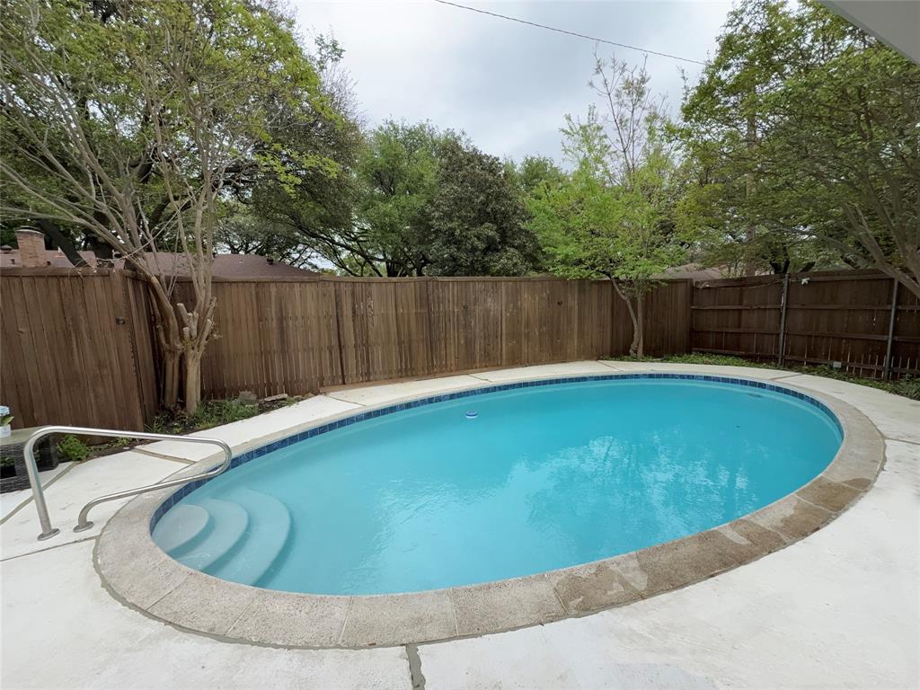10427 Carry Back Place Dallas, TX 75229 - Photo 6 of 40 Newly Resurfaced pool and concrete deck! Your own Backyard Oasis!