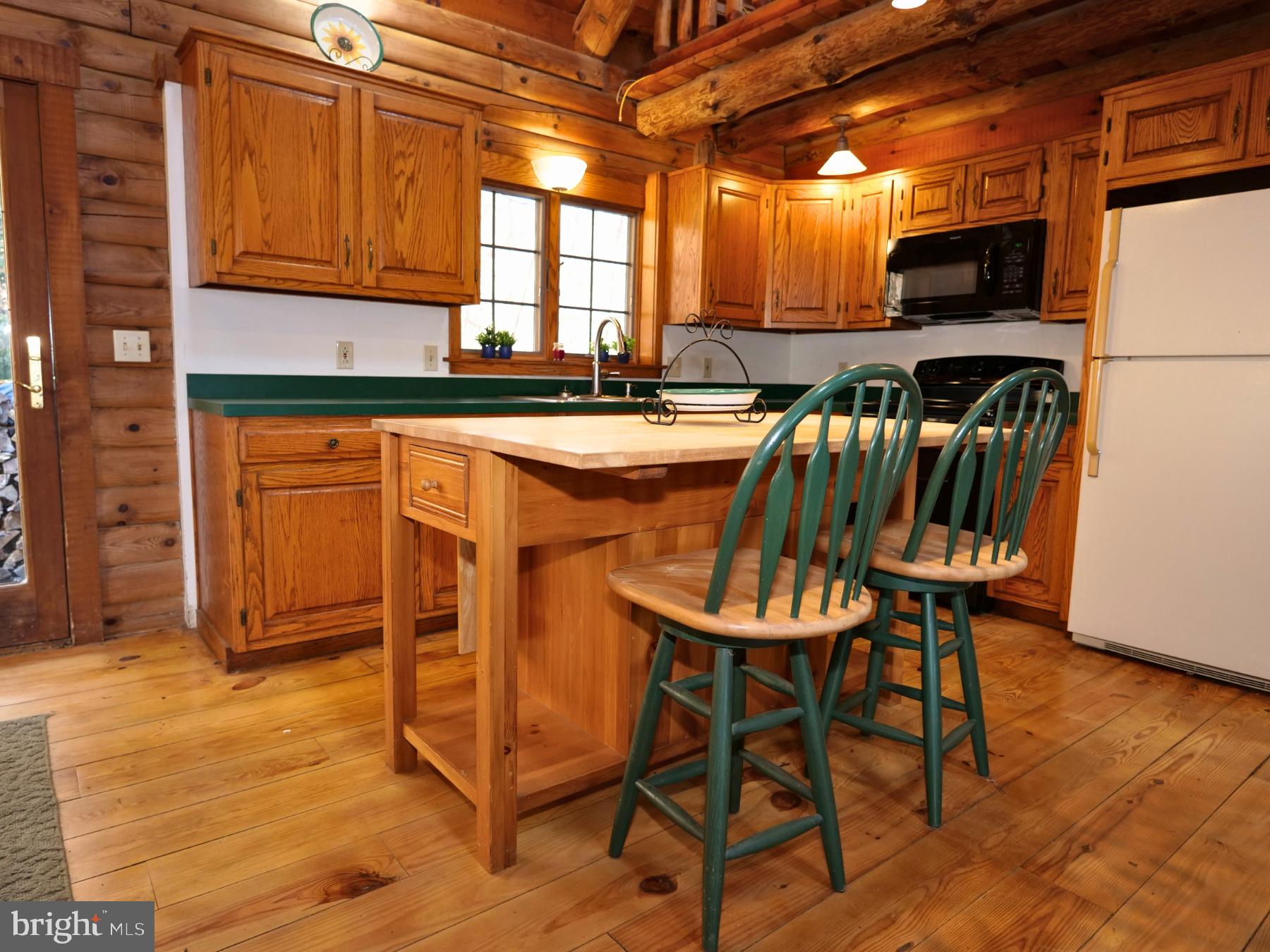 112 Sandy Hill Road Boyertown, PA 19512 - Photo 18 of 37 a kitchen with stainless steel appliances granite countertop a stove a sink and a refrigerator