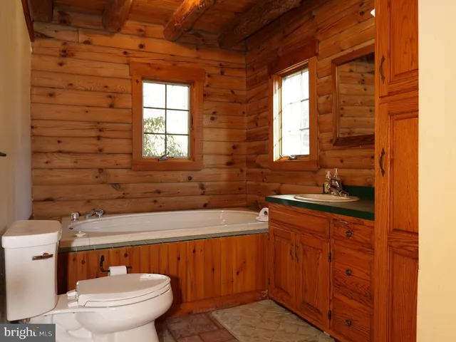 a bathroom with a sink and a bathtub