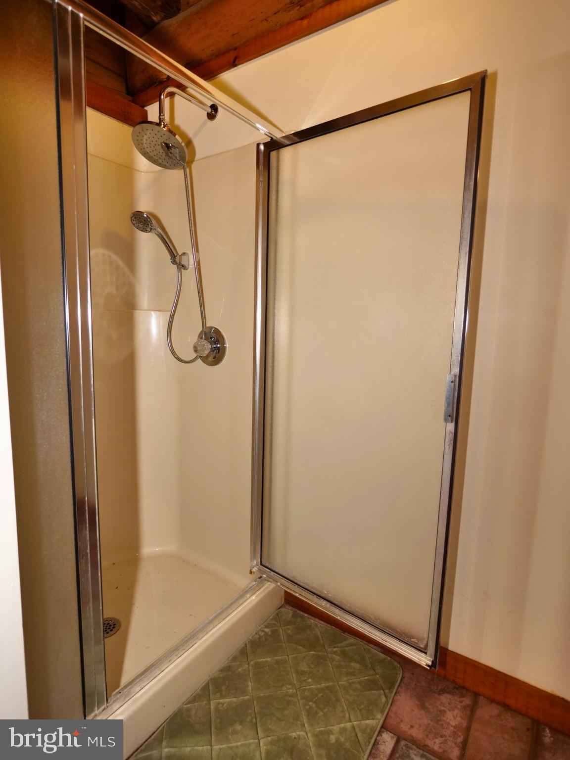 112 Sandy Hill Road Boyertown, PA 19512 - Photo 26 of 37 a bathroom with a glass shower door