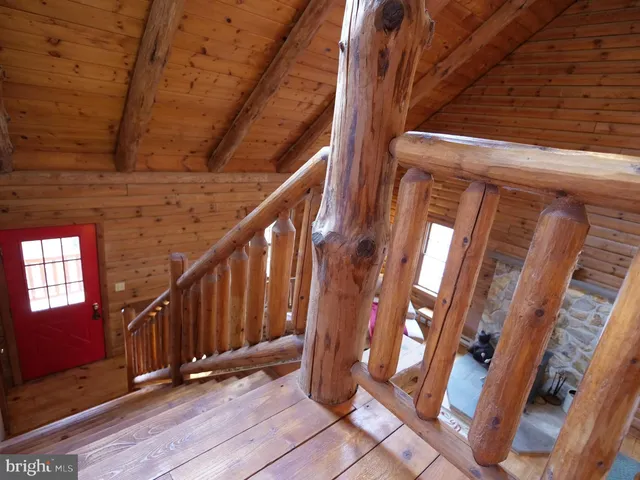 a view of balcony with wooden floor