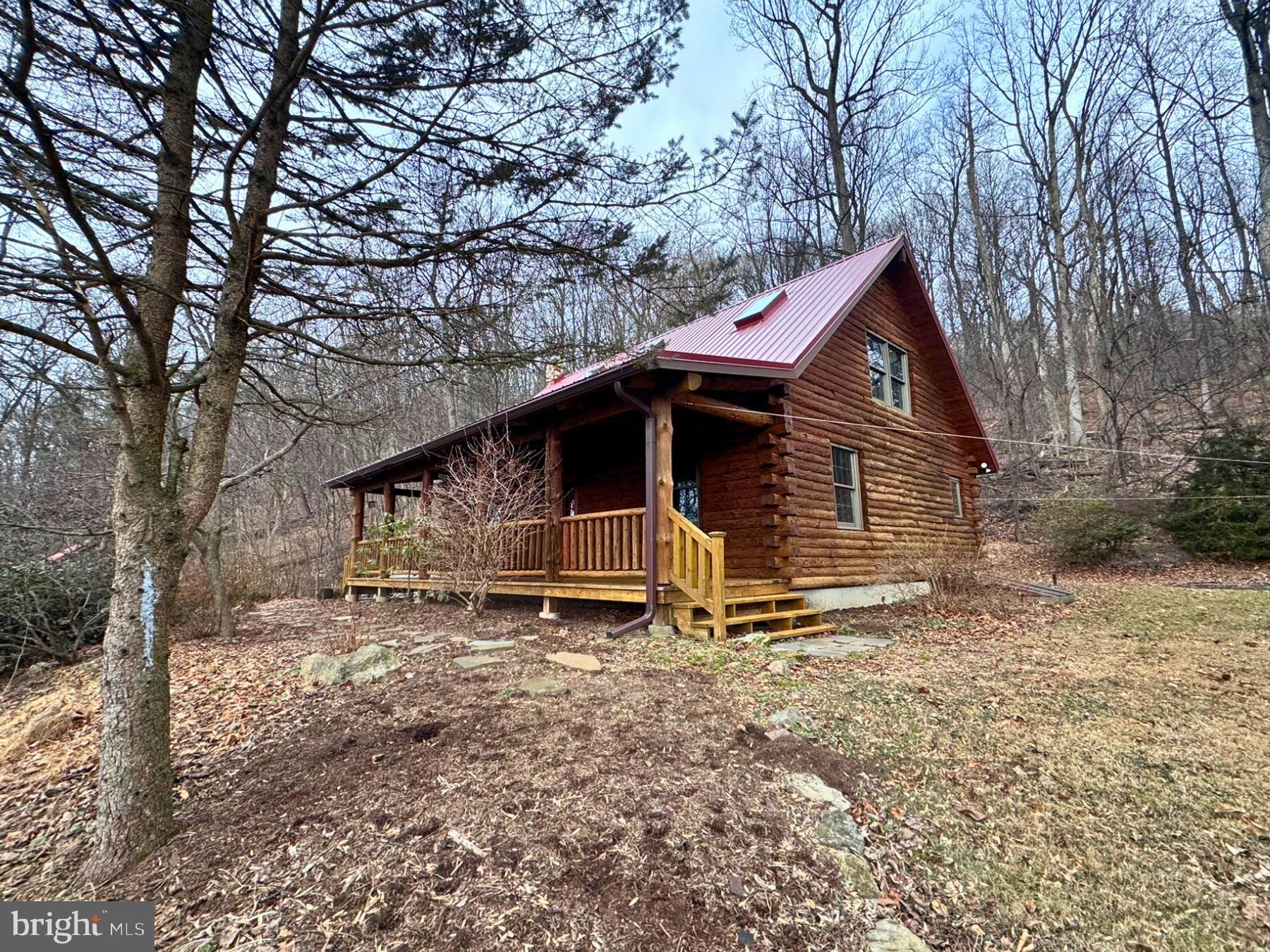 112 Sandy Hill Road Boyertown, PA 19512 - Photo 3 of 37 a front view of a house with garden