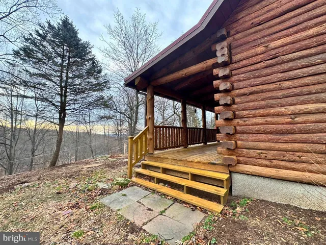 a backyard of a house with a mountain
