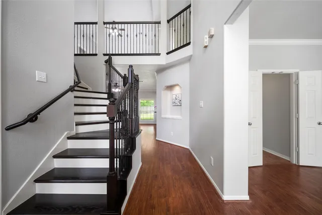 a view of entryway with wooden floor