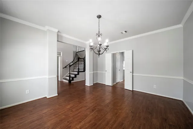 a view of a livingroom with wooden floor