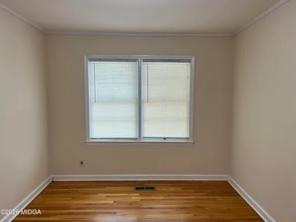 an empty room with window