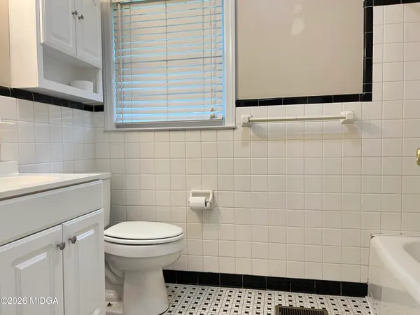 a bathroom with a toilet