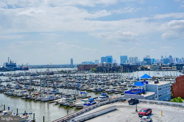 a view of a balcony with table and chairs
