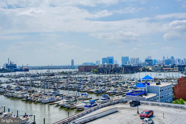 a view of a balcony with table and chairs