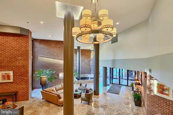 a view of a living room and entry way