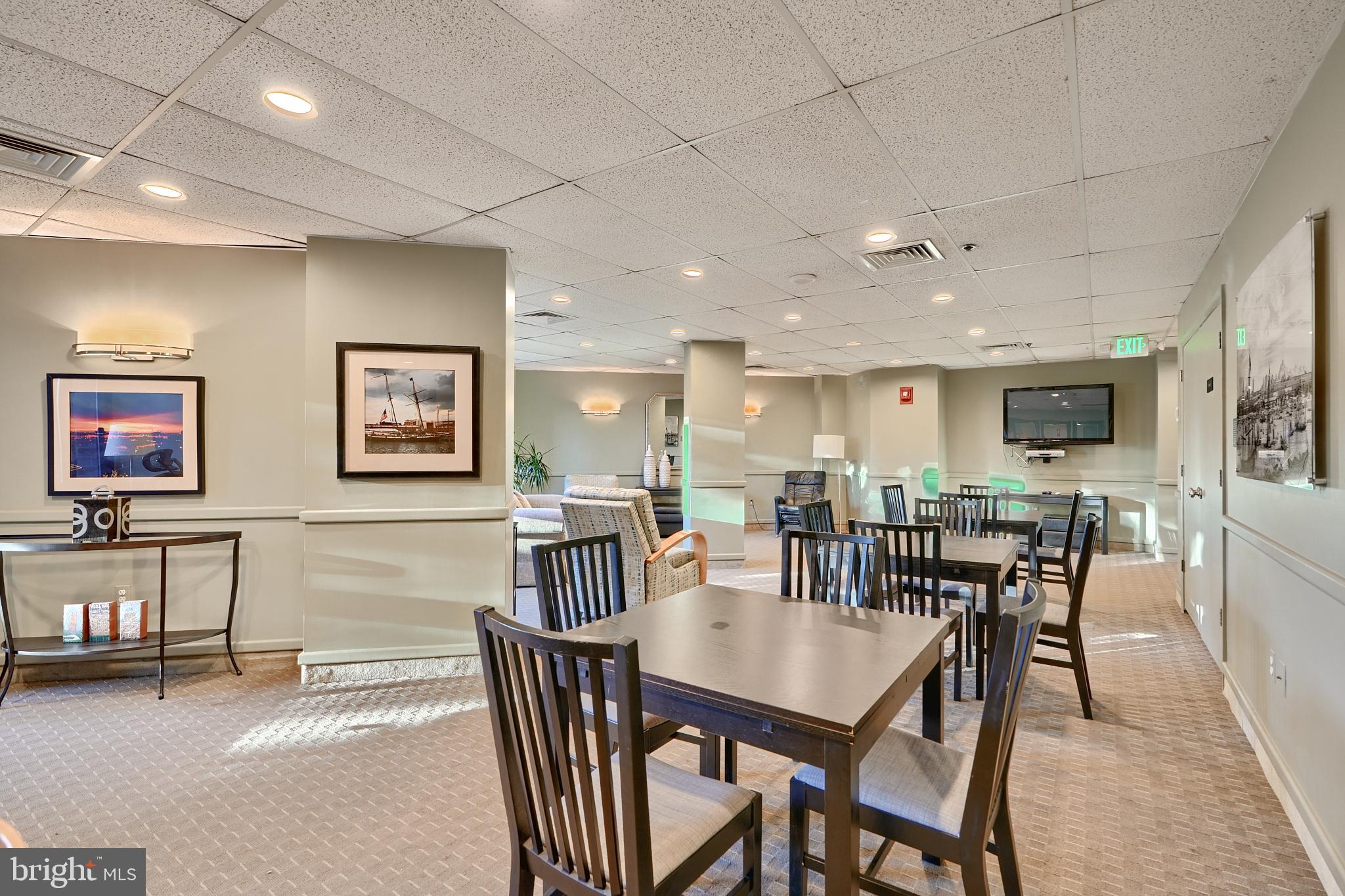 2515 Boston Street, Unit 706 Baltimore, MD 21224 - Photo 18 of 21 a view of a dining room with furniture