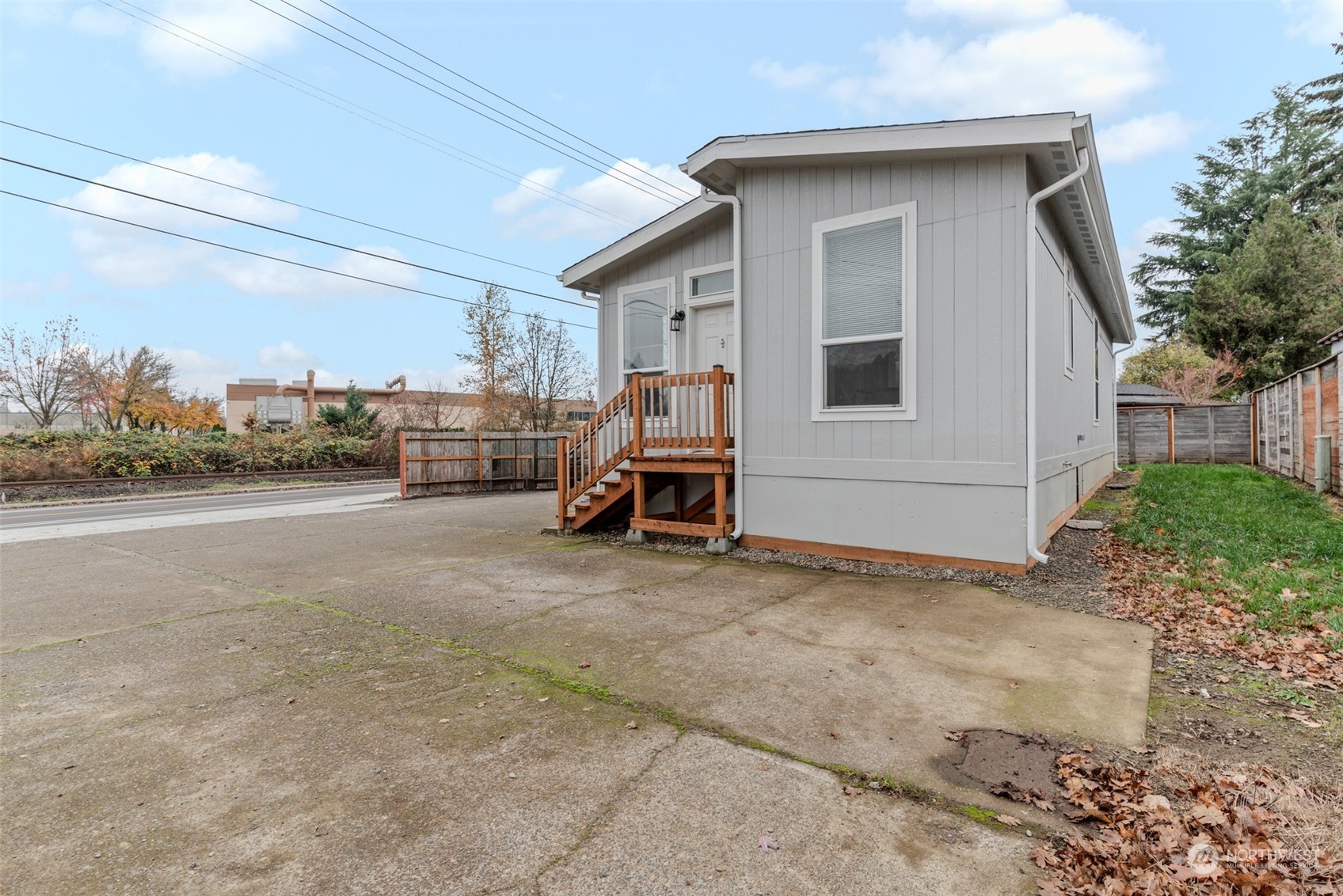 9811 Southwest Herman Road, Unit 45 Tualatin, OR 97062 - Photo 26 of 28 a view of car parked in front of house