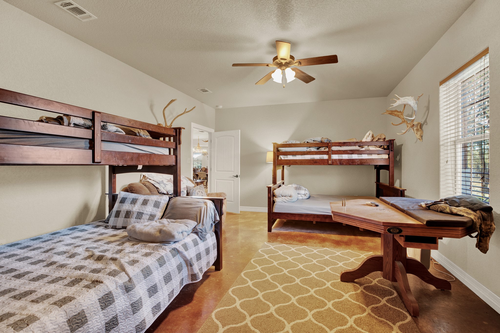 3691 K2 Road Leakey, TX 78873 - Photo 10 of 34 a bedroom with furniture and a window