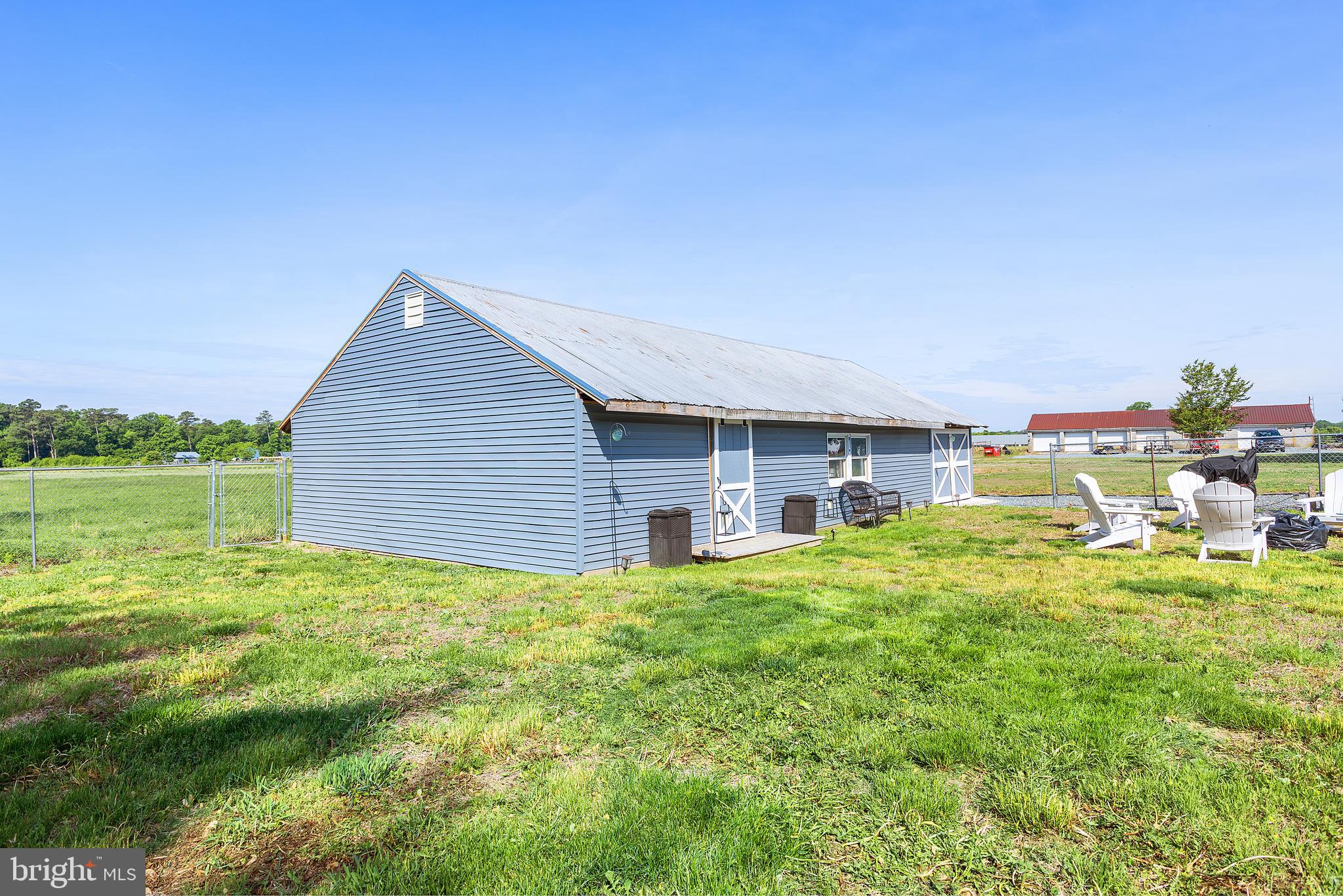25485 Hignutt Road Denton, MD 21629 - Photo 47 of 52 a view of a house with a yard