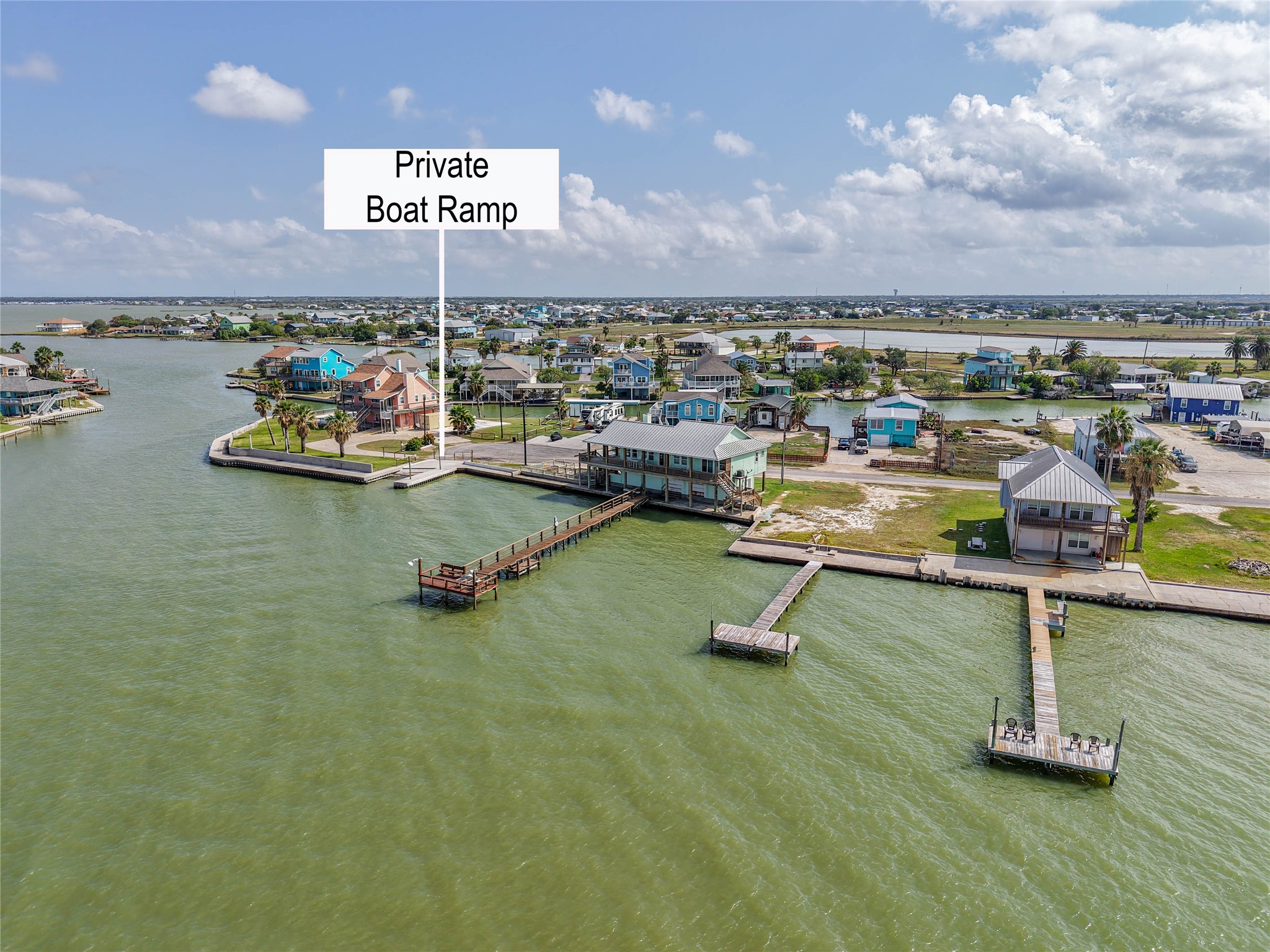 740 Copano Cove Road Rockport, TX 78382 - Photo 1 of 35 a view of a swimming pool with seating area