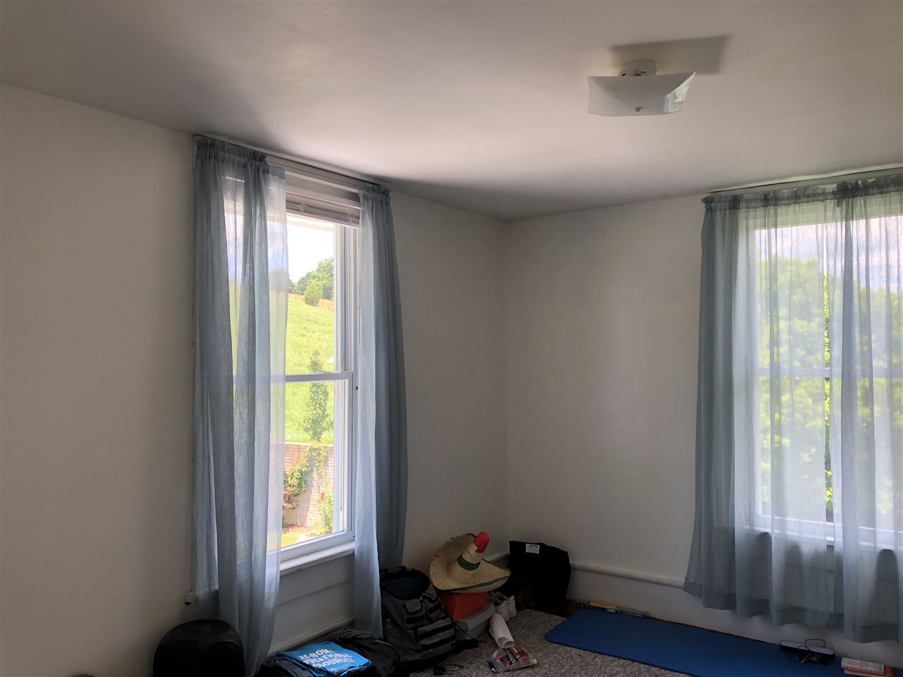 6945 Spring Creek Road Bridgewater, VA 22812 - Photo 12 of 37 a room with wooden floor and a window