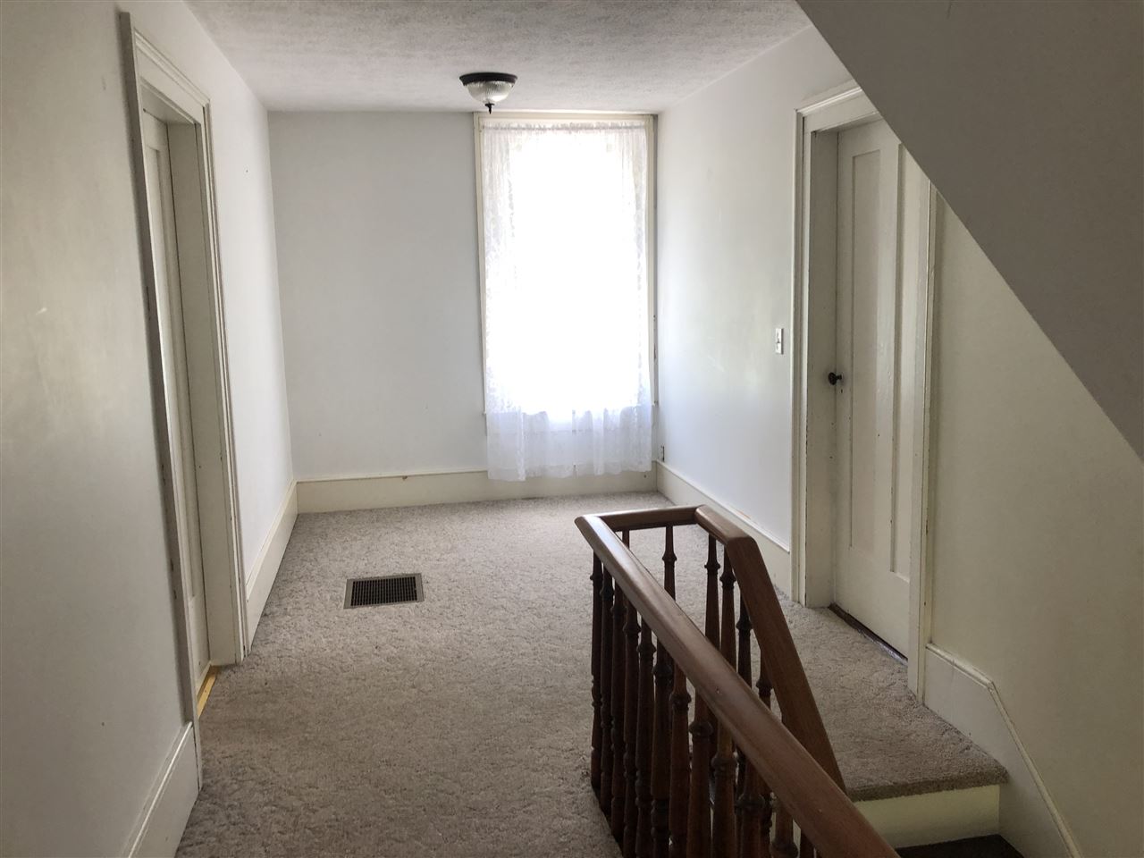 6945 Spring Creek Road Bridgewater, VA 22812 - Photo 14 of 37 a view of a hallway with stairs