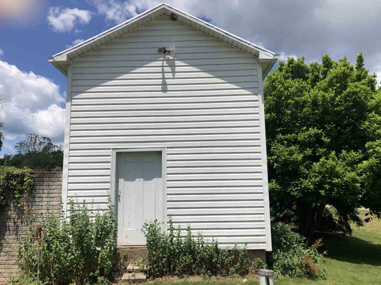 6945 Spring Creek Road Bridgewater, VA 22812 - Photo 27 of 37 a front view of a house with a garage