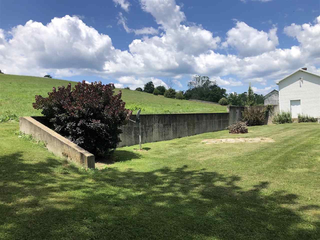 6945 Spring Creek Road Bridgewater, VA 22812 - Photo 32 of 37 a backyard of a house with lots of green space
