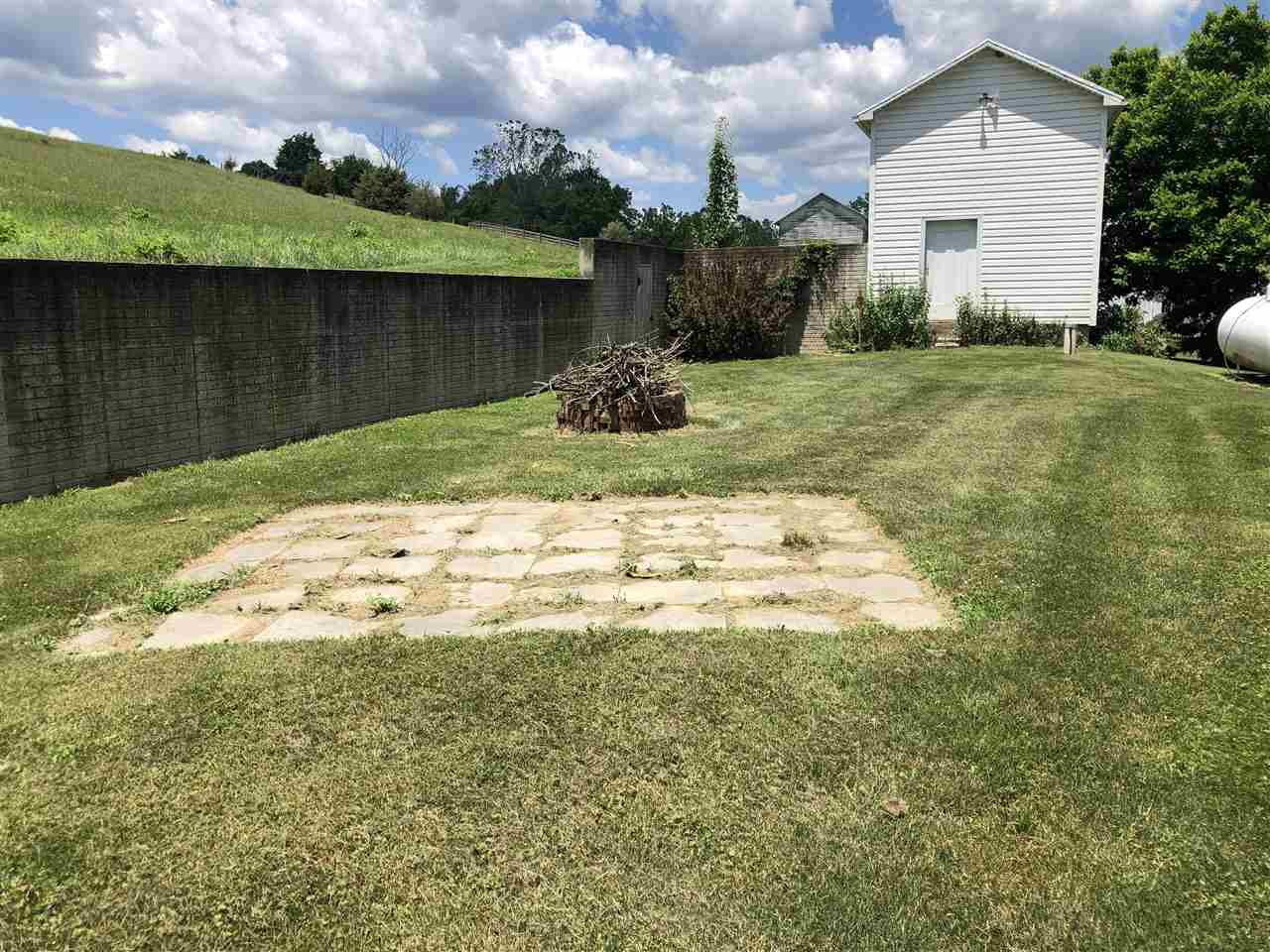 6945 Spring Creek Road Bridgewater, VA 22812 - Photo 33 of 37 a backyard of a house with lots of green space
