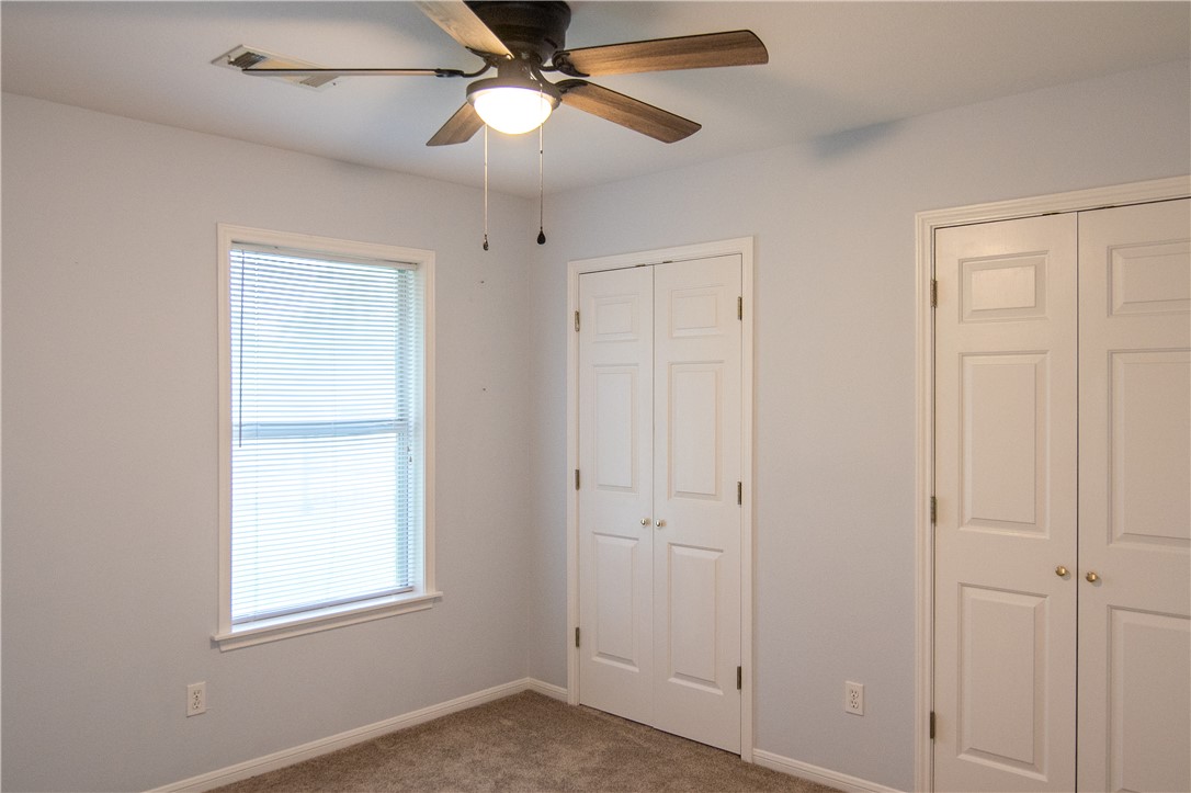 1735 Rock Hollow Loop Bryan, TX 77807 - Photo 16 of 25 a view of an empty room with a window
