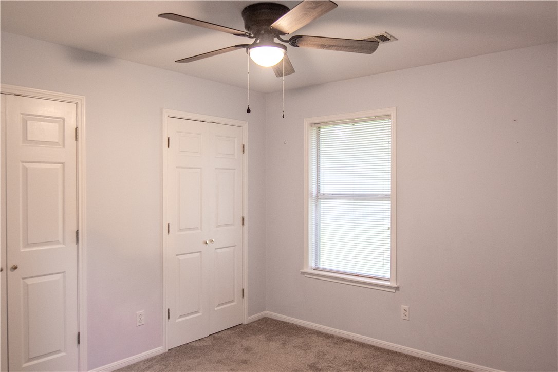1735 Rock Hollow Loop Bryan, TX 77807 - Photo 18 of 25 a view of an empty room with a window